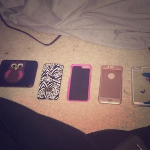 Four phone cases and one wallet